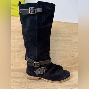 Black Leather boots .